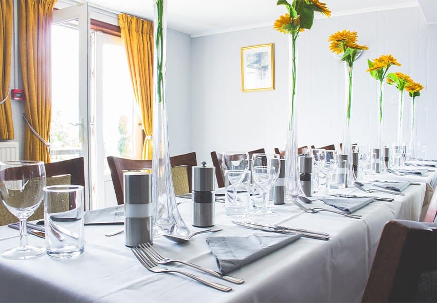 The Charleston Suite laid for dinner